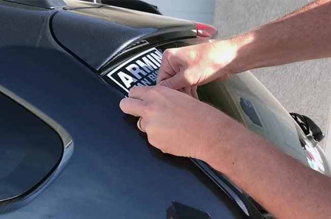 how to remove stickers from windshield